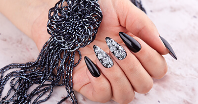 Acrylic nail enhancement service at Bliss Beauty Bar Lockport NY